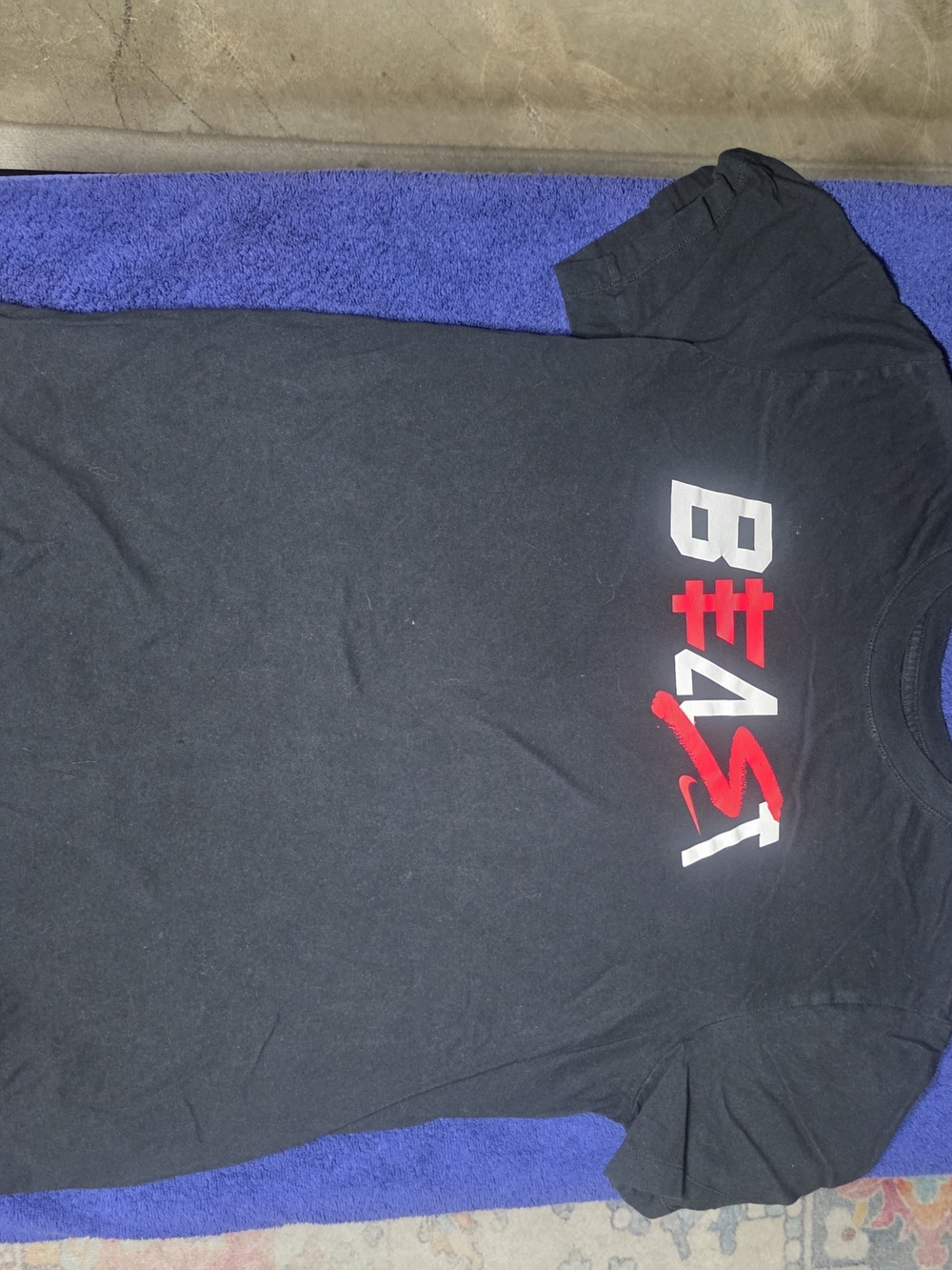 Nike Black Short-Sleeve Tee with Red and White Beast Graphic